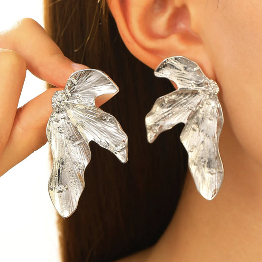 Piper Earrings showcasing oversized silver chunky jewelry, designed for a bold fashion statement.